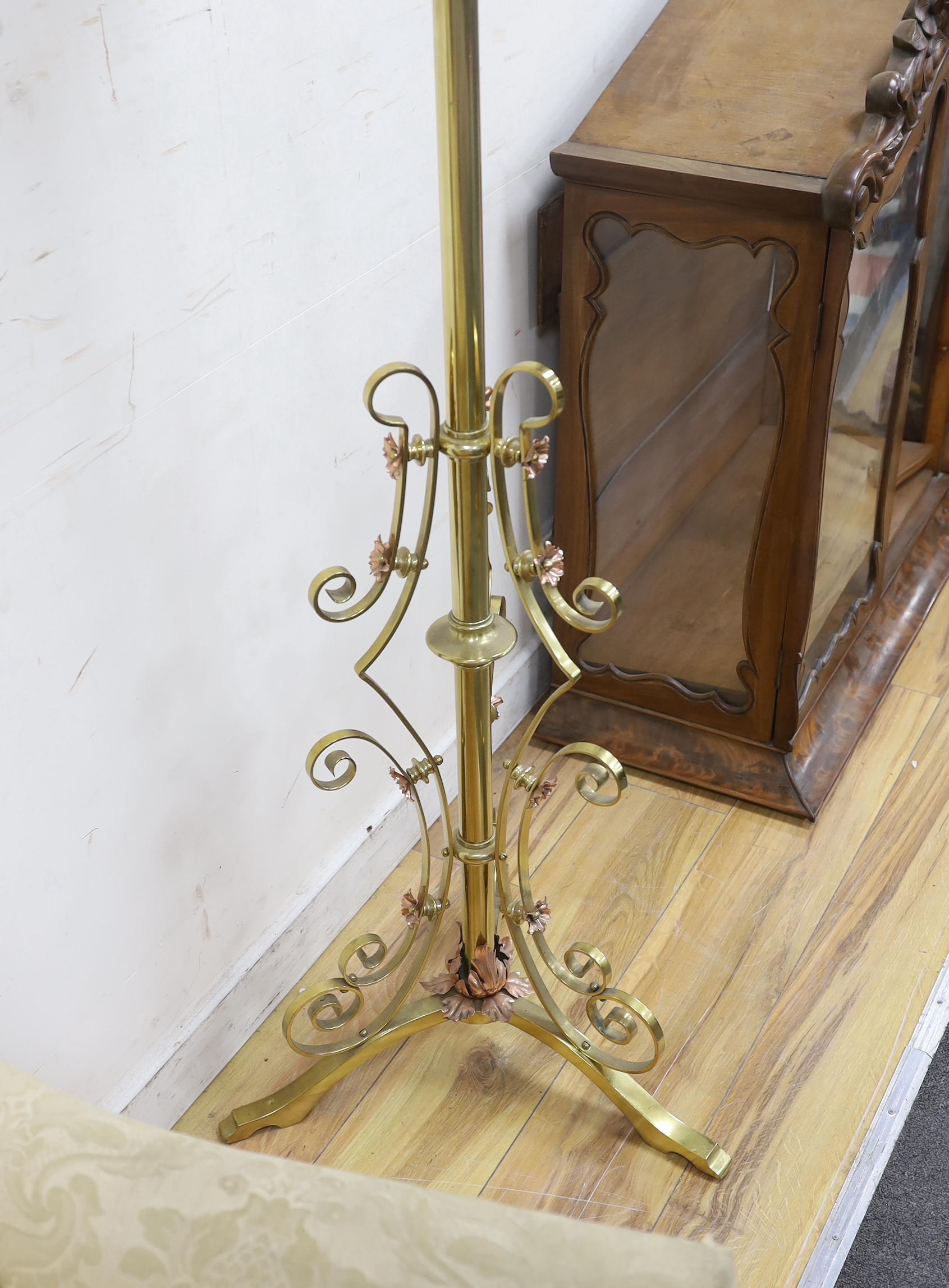 A late Victorian copper and brass telescopic oil standard lamp converted to electricity, height 156cm